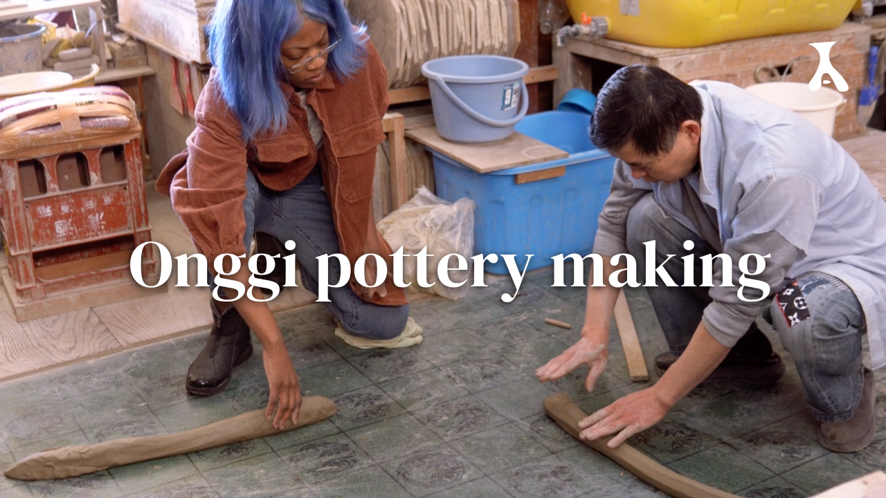 Load video: video of a woman learning how to make onggi ceramics
